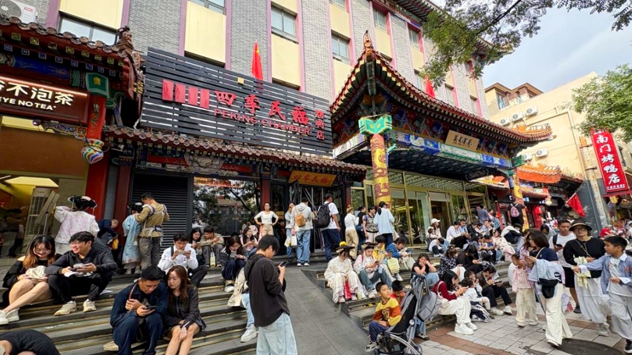 Queues outside Peking Chamber in Beijing